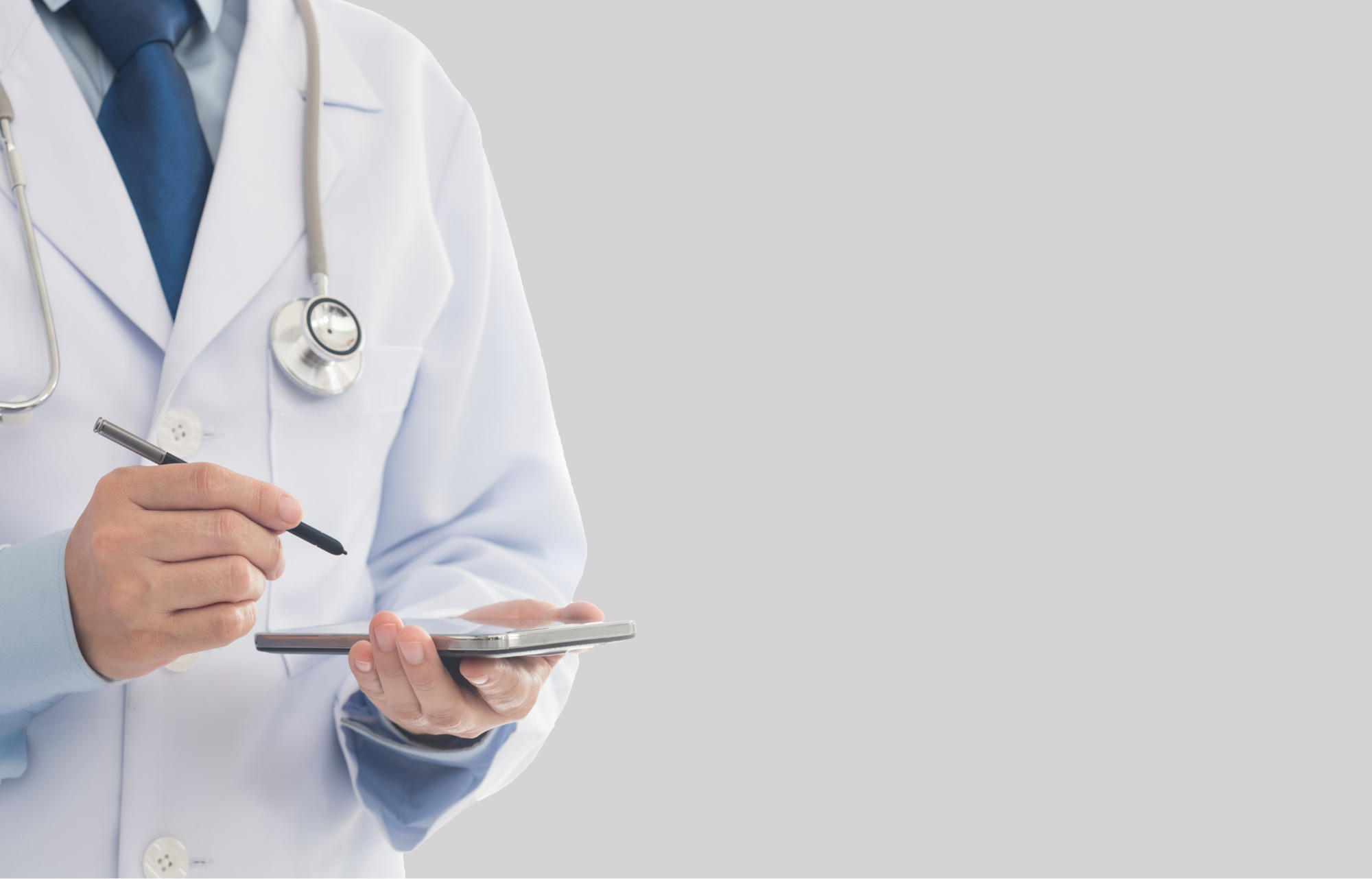 Zdjęcie przedstawia lekarza ze stetoskopem